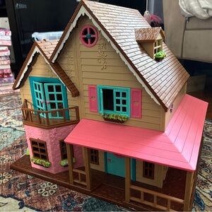 Li'l Woodzeez Honeysuckle Hillside Cottage toy house.